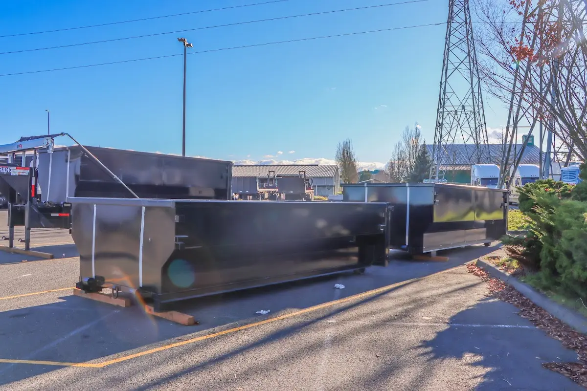Roll-off dumpster ready for waste disposal at job site for Construction Dumpster Rental in Muscatine